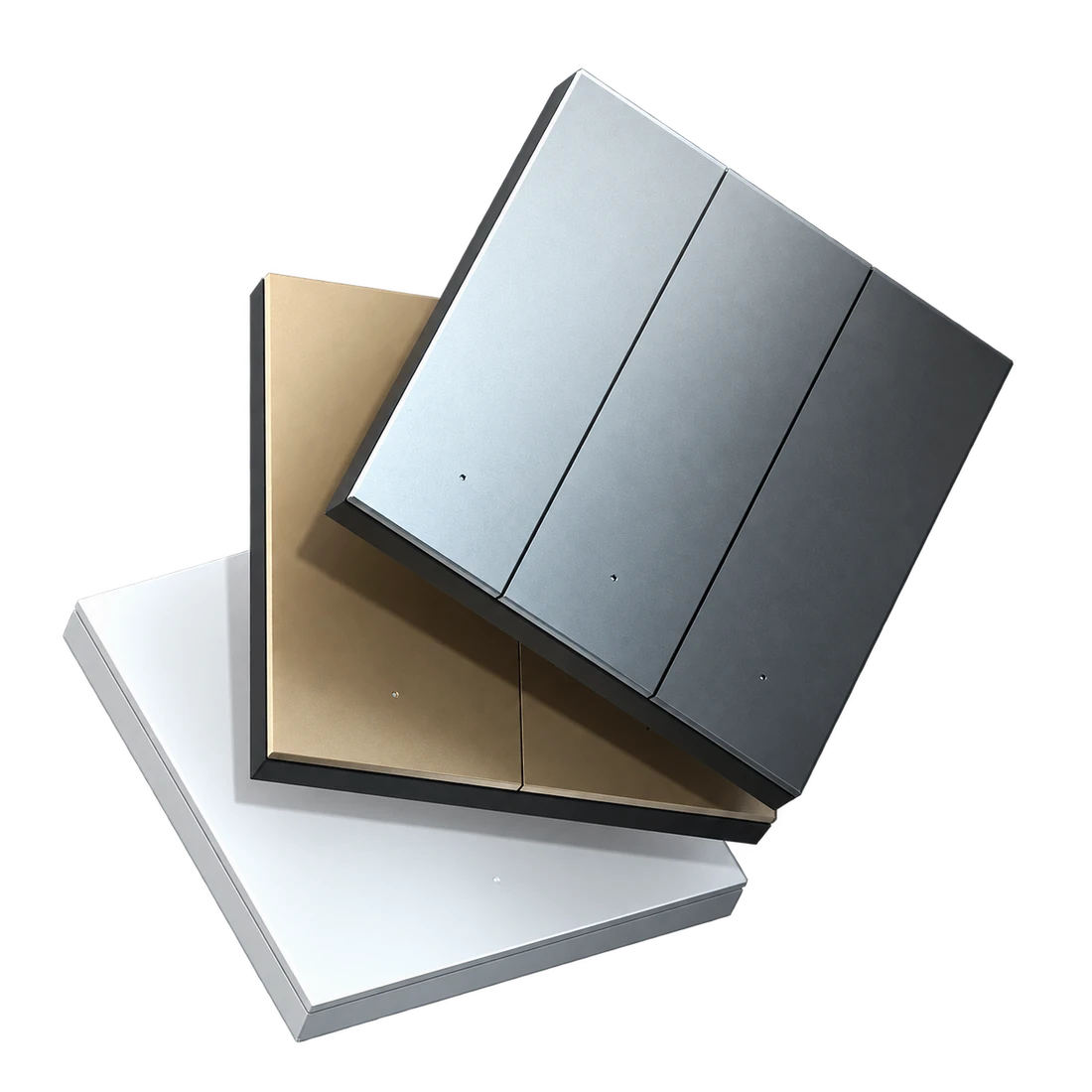 MixSwitch wall controls in silver, champagne and white, stacked to show their slim profiles